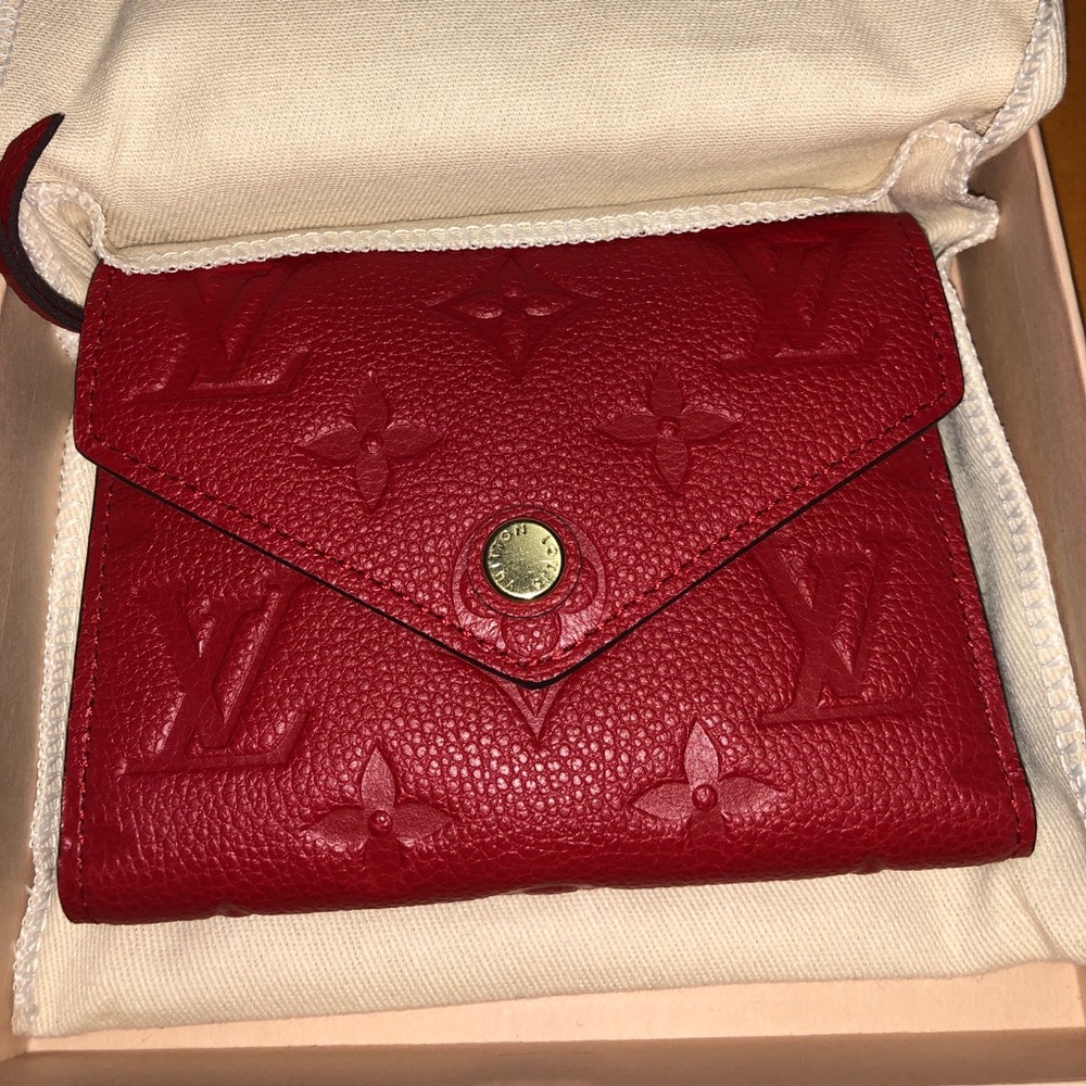 Brand New Authentic Vuitton Victorine wallet